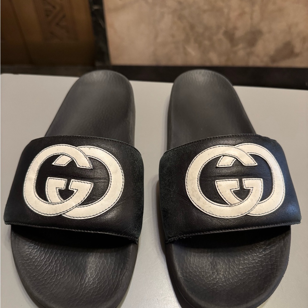 Gucci Black and White Slide Sandals with Embossed Logo